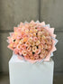 Georgia Peach Grand bouquet of 100 long-stem peach roses in decorative wrapping