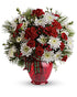Joyful Gesture Bouquet in a red ginger jar vase.